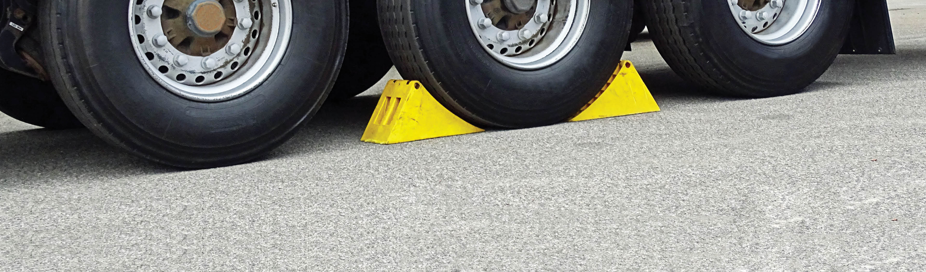 The Battle of Wheel Chocks Rubber vs. Urethane TENAQUIP